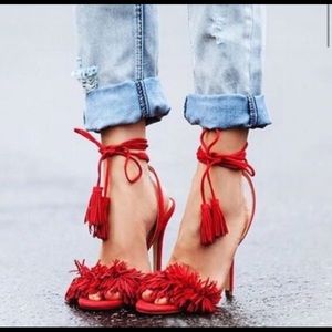 Red pom tassel heels